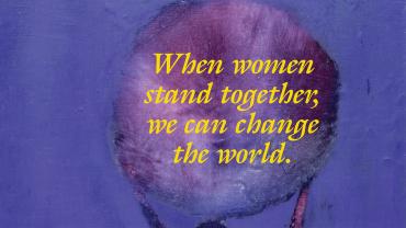 Woman holding globe. Text reads: when women stand together, we can change the world